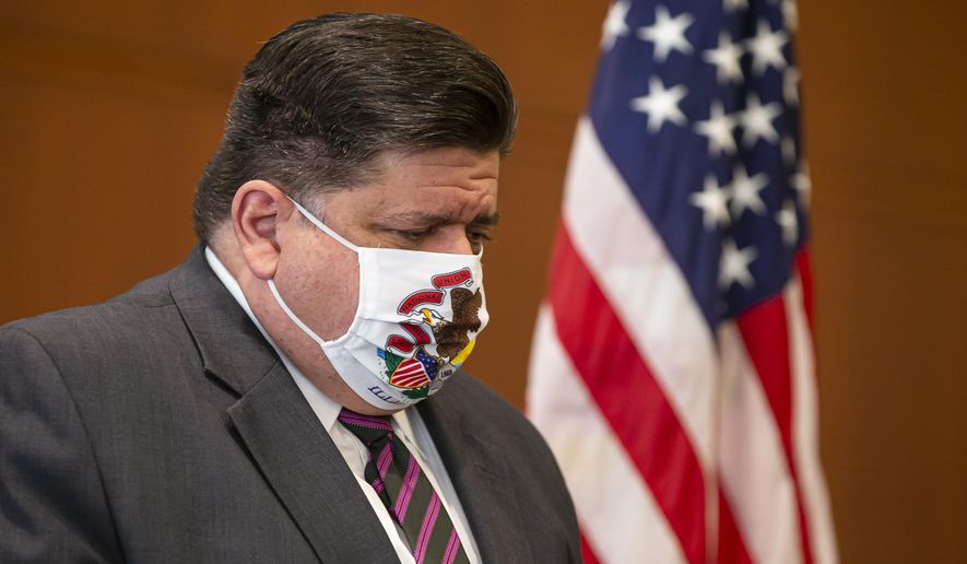 FILE - In this Sept. 21, 2020 file photo, Illinois Governor JB Pritzker appears at a news conference in Springfield, Ill. Voters have rejected a proposal to abolish Illinois' flat-rate income tax for one that would take a greater share from wealthier taxpayers. The outcome of Tuesday's Nov. 3, vote handed Pritzker the first major defeat of his 22-month tenure. (Justin L. Fowler/The State Journal-Register via AP File)