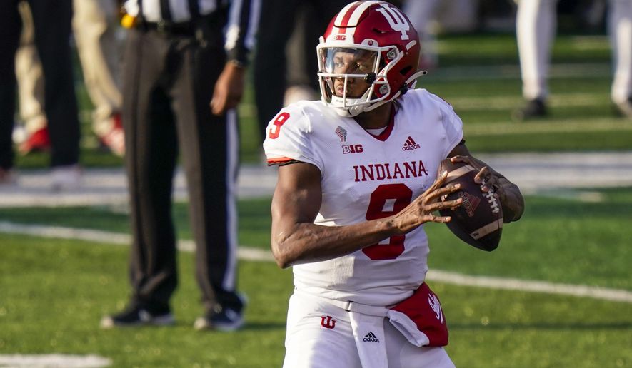 Indiana quarterback Michael Penix Jr. looks for a receiver during the second quarter of the team's NCAA college football game against Rutgers, Saturday, Oct. 31, 2020, in Piscataway, N.J. (AP Photo/Corey Sipkin)