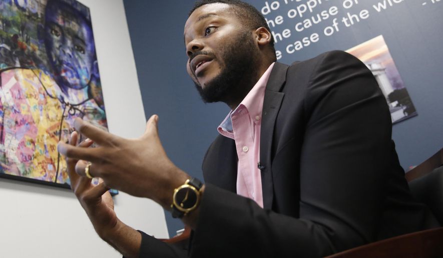 In this Wednesday Aug. 14, 2019, file photo Stockton Mayor Michael Tubbs talks during an interview in Stockton, Calif.  Tubbs is one of the youngest mayors in the country and was the city’s first Black mayor. He garnered national attention with his universal basic income program that fights poverty by paying people $500 a month. But despite winning 70% of the vote, Tubbs is trailing a Republican challenger, putting him in danger of losing his seat.  (AP Photo/Rich Pedroncelli, File)