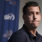 FILE - In this Feb. 14, 2019, file photo, New York Mets general manager Brodie Van Wagenen pauses while speaking to the media following spring training baseball practice in Port St. Lucie, Fla. Van Wagenen and many of his top aides are out, moves announced less than an hour after hedge fund manager Steve Cohen completed his $2.4 billion purchase of the team Friday, Nov. 6, 2020.   (AP Photo/Jeff Roberson, File)
