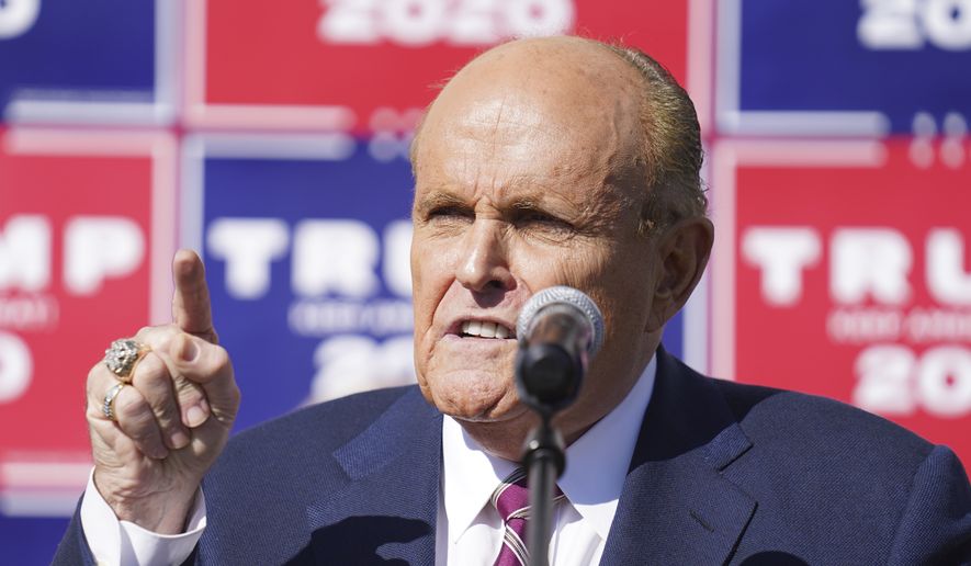 Former New York mayor Rudy Giuliani, a lawyer for President Donald Trump, speaks during a news conference on legal challenges to vote counting in Pennsylvania, Saturday Nov. 7, 2020, in Philadelphia. (AP Photo/John Minchillo)