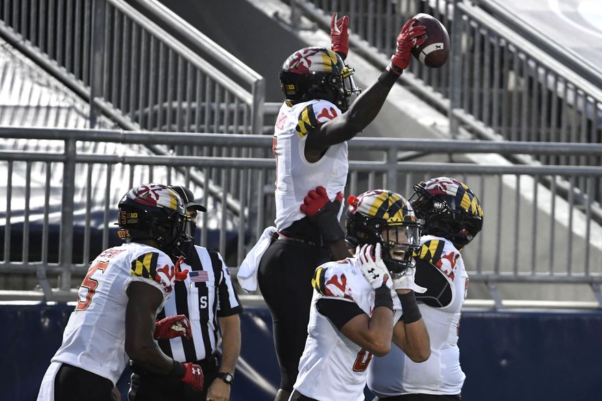 Maryland wide receiver Dontay Demus Jr. (7) celebrates a second-quarter touchdown pass against Penn State during an NCAA college football game in State College, Pa., Saturday, Nov. 7, 2020. (AP Photo/Barry Reeger)