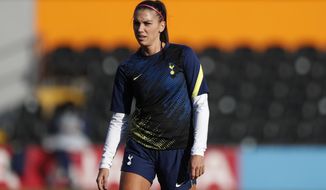 Tottenham Hotspur&#x27;s Alex Morgan warms up ahead of the the English Women&#x27;s Super League soccer match between Tottenham Hotspur and Reading at the Hive stadium in London, Saturday, Nov. 7, 2020. (AP Photo/Alastair Grant)