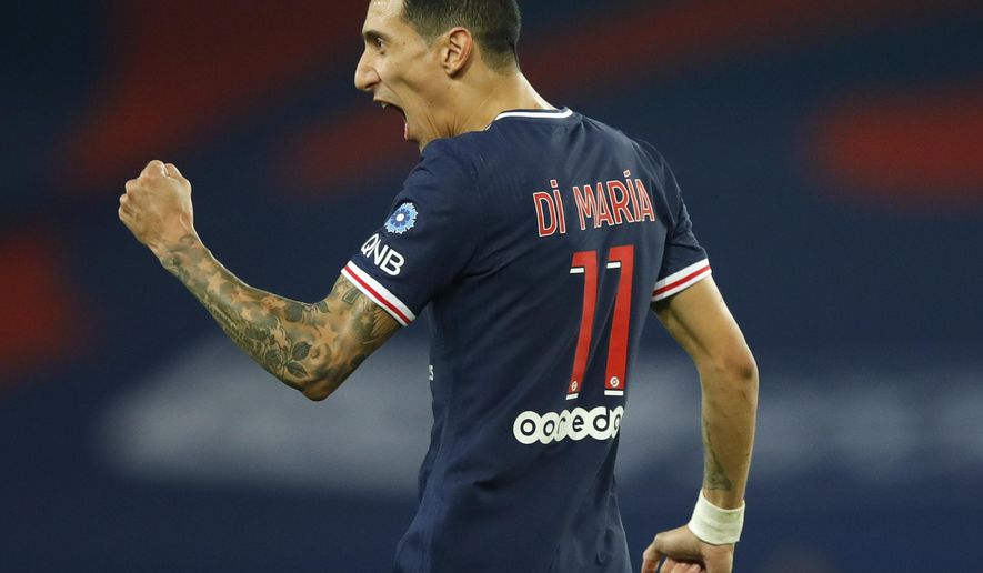 PSG&#39;s Angel Di Maria celebrates after scoring his side&#39;s third goal during the French League One soccer match between Paris Saint-Germain and Rennes at the Parc des Princes in Paris, France, Saturday, Nov. 7, 2020. (AP Photo/Christophe Ena)