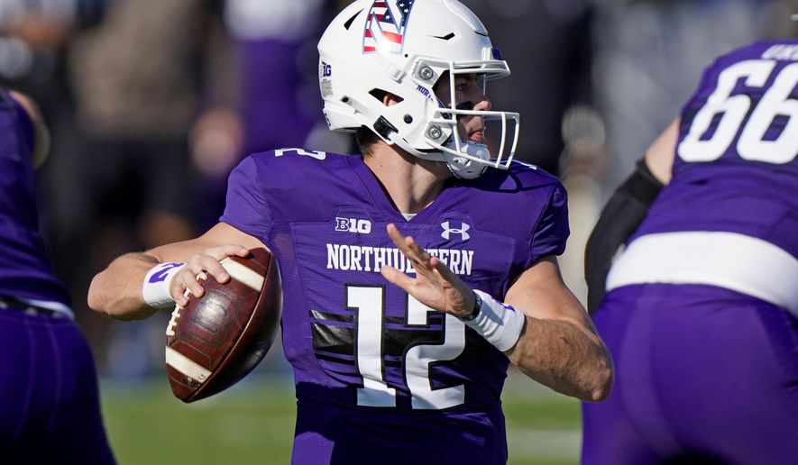 Northwestern quarterback Peyton Ramsey throws a pass against Nebraska during the first half of an NCAA college football game in Evanston, Ill., Saturday, Nov. 7, 2020. (AP Photo/Nam Y. Huh)