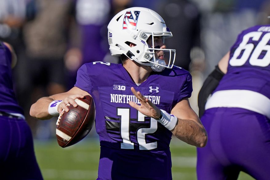 Northwestern quarterback Peyton Ramsey throws a pass against Nebraska during the first half of an NCAA college football game in Evanston, Ill., Saturday, Nov. 7, 2020. (AP Photo/Nam Y. Huh)