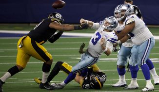 Pittsburgh Steelers&#39; Stephon Tuitt, left, and linebacker T.J. Watt (90) pressure Dallas Cowboys quarterback Garrett Gilbert (3) who throws a pass to Ezekiel Elliott (21) as center Joe Looney (73) and guard Connor Williams, right rear, look on during the play in the second half of an NFL football game in Arlington, Texas, Sunday, Nov. 8, 2020. (AP Photo/Ron Jenkins)