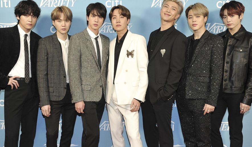 FILE - Korean pop band BTS attends the 2019 Variety's Hitmakers Brunch in West Hollywood, Calif., on Dec. 7, 2019. The South Korean boy band BTS HAS won a leading four awards including best song for “Dynamite” and best group at the MTV Europe Music Awards Sunday, Nov. 8, 2020 while Lady Gaga took home the best artist prize.(Photo by Richard Shotwell/Invision/AP, File)