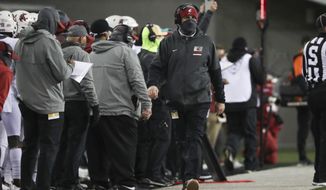 Washington State coach Nick Rolovich along the sideline during the first half of the team&#39;s NCAA college football game against Oregon State in Corvallis, Ore., Saturday, Nov. 7, 2020. (AP Photo/Amanda Loman)