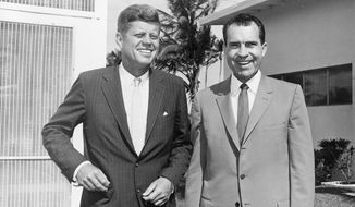 President-elect John F. Kennedy, left, and Vice President Richard Nixon are shown after their post-campaign conference at Key Biscayne in Miami, Fla., on Nov. 14, 1960.  (AP Photo)