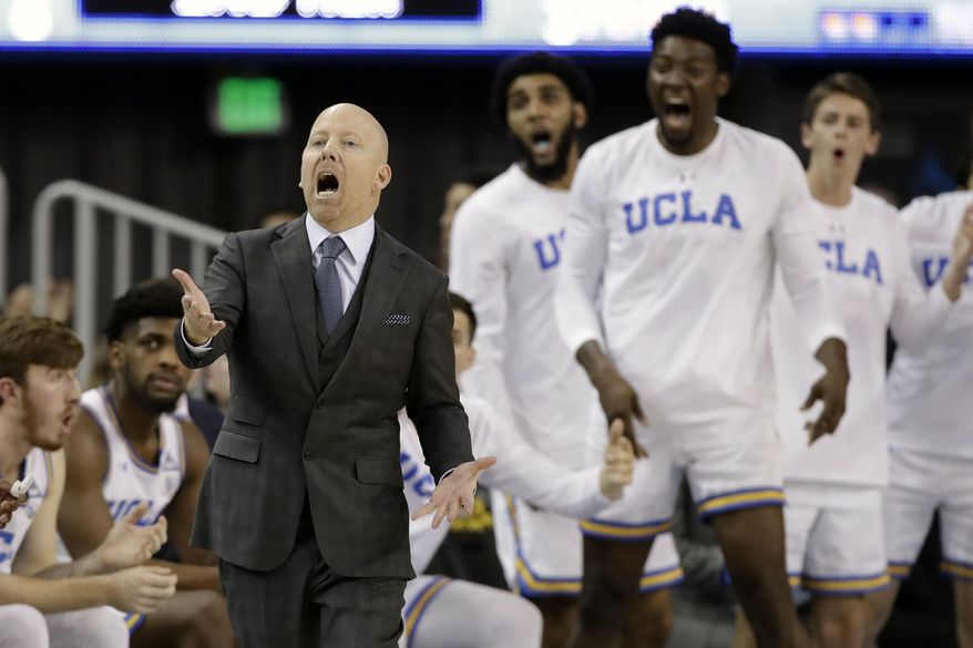 FILE - In this Thursday, Feb. 13, 2020, file photo, UCLA coach Mick Cronin argues a call during the second half of the team's NCAA college basketball game against Washington State, in Los Angeles. Cronin earned Pac-12 coach of the year honors for the 2019-20 season. (AP Photo/Marcio Jose Sanchez, File)