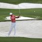 Tiger Woods practices on his sand shots on the practice range at Augusta National Golf Club in Augusta, Ga., Tuesday, Nov 10, 2020. The Masters golf tournament begins Thursday in Augusta. (Curtis ComptonAtlanta Journal-Constitution via AP)