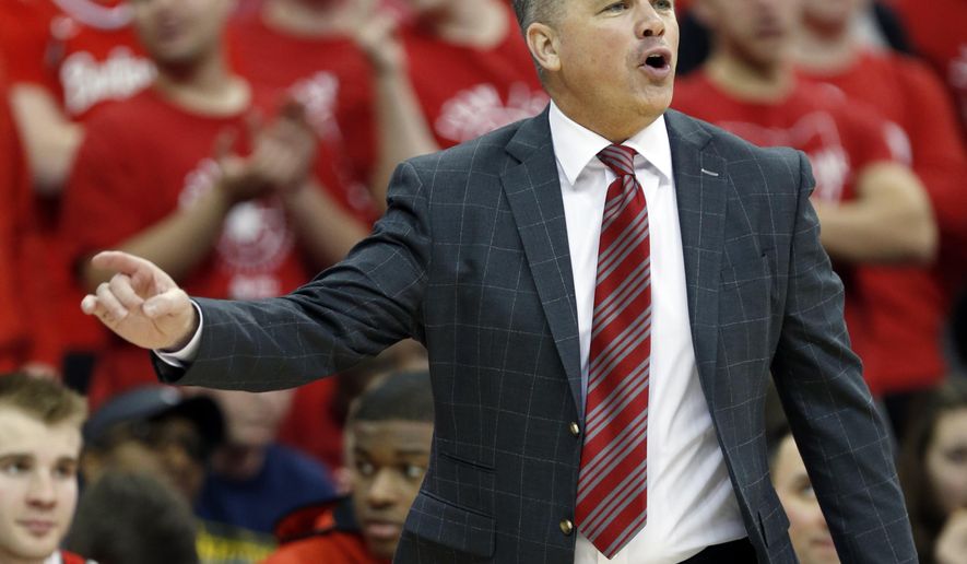 FILE - In this March 1, 2020, file photo, Ohio State coach Chris Holtmann directs his team against Michigan during the second half of an NCAA college basketball game in Columbus, Ohio. Transfer rules have generated a lot of comings and goings in the Ohio State basketball program. Add a preseason practice schedule affected by COVID-19 restrictions, and it’s no wonder coach Chris Holtmann is still trying to figure out where all the pieces will fit. (AP Photo/Paul Vernon, File)