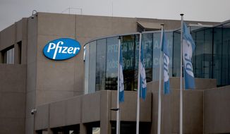 A general view of Pfizer Manufacturing Belgium in Puurs, Belgium, Monday, Nov. 9, 2020. Pfizer said Monday that early results from its coronavirus vaccine suggest the shots may be a surprisingly robust 90% effective at preventing COVID-19, putting the company on track to apply later this month for emergency-use approval from the Food and Drug Administration in the United States. (AP Photo/Virginia Mayo)