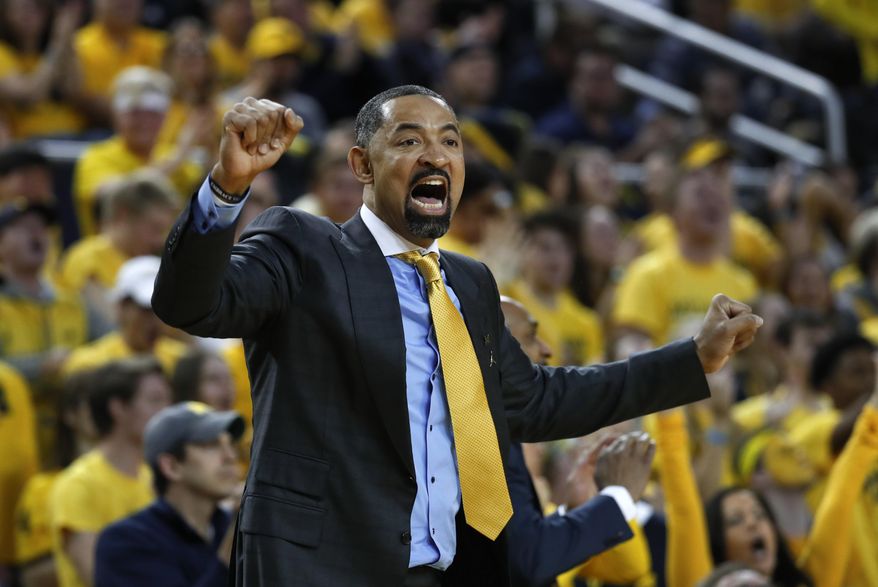 FILE - In this Saturday, Feb. 8, 2020, file photo, Michigan head coach Juwan Howard reacts to a call in the first half of an NCAA college basketball game against Michigan State, in Ann Arbor, Mich. Howard's 2021 class is rated No. 1 in the 247Sports composite. (AP Photo/Paul Sancya, File)