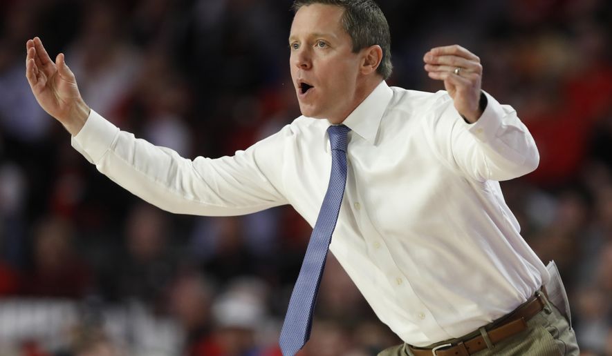 FILE  - In this March 4, 2020, file photo, Florida coach Mike White gestures during an NCAA college basketball game against Georgia in Athens, Ga. Unlike a year ago, Florida begins the season unranked and won’t have nearly as much hype. (Joshua L. Jones/Athens Banner-Herald via AP, File)
