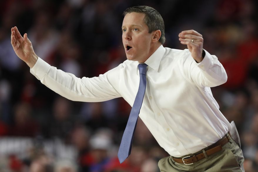 FILE  - In this March 4, 2020, file photo, Florida coach Mike White gestures during an NCAA college basketball game against Georgia in Athens, Ga. Unlike a year ago, Florida begins the season unranked and won’t have nearly as much hype. (Joshua L. Jones/Athens Banner-Herald via AP, File)