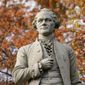 In this Tuesday, Nov. 10, 2020, file photo, a statue of Alexander Hamilton stands in Central Park in New York. A new research paper takes a swipe at the popular image of Alexander Hamilton as the abolitionist founding father, citing evidence that he was a slave trader and owner himself. (AP Photo/Frank Franklin II, File)