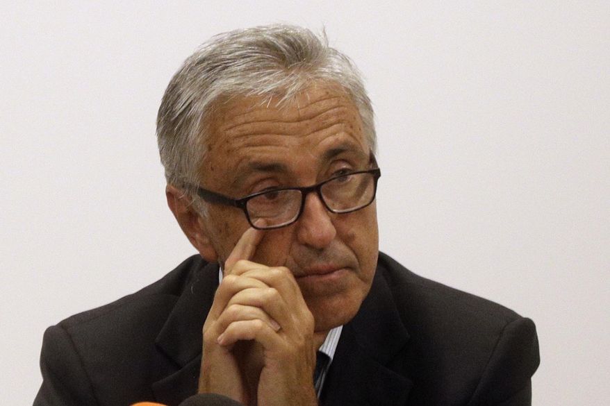 FILE - In this Aug. 18, 2018 file photo, Autostrade per L'Italia CEO Giovanni Castellucci attends a press conference in Genoa, Italy. Italian financial police on Wednesday issued arrest warrants against six current and former managers of Italy’s main private highway operator as part of the investigation into the Genoa bridge collapse that killed 43 people in August 2018. Three - including Castellucci - have been put under house arrest as part of a probe into defects in highway barriers linked to the deadly bridge collapse, while another three faced restrictive measures. (AP Photo/Gregorio Borgia)