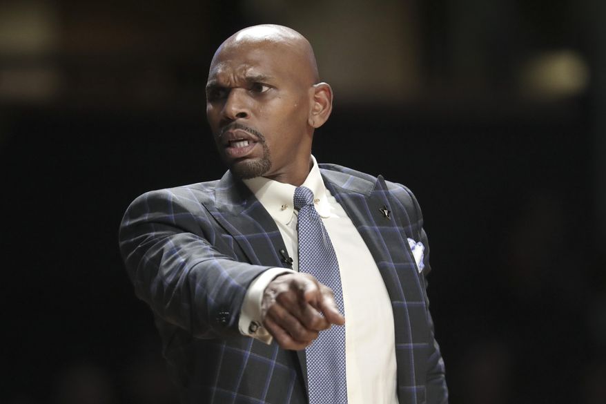 FILE — In this Feb. 5, 2020, file photo, Vanderbilt coach Jerry Stackhouse directs his players during an NCAA college basketball game against LSU in Nashville, Tenn. Stackhouse knows he has a fuller roster going into his second season. He also believes he and his assistants are better prepared as well. (AP Photo/Mark Humphrey, file)