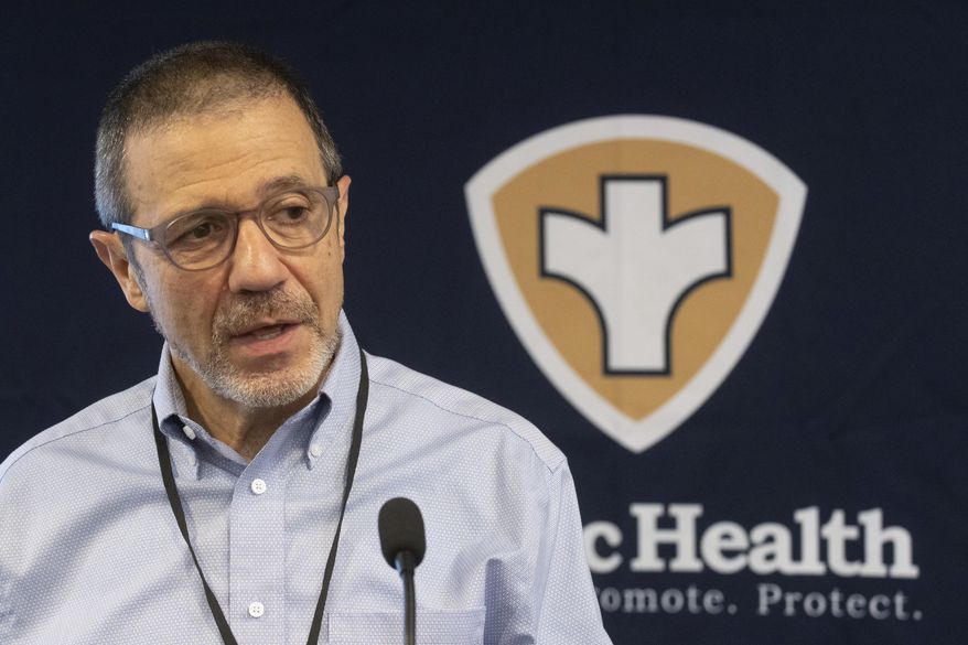 Gianfranco Pezzino, Shawnee County health officer, explains new health orders during a coronavirus press conference Friday, Aug. 21, 2020, at the Shawnee County health department in Topeka, Kan. ==(Evert Nelson/The Topeka Capital-Journal via AP)