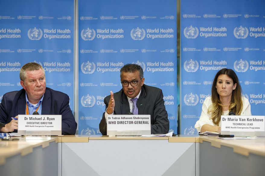 FILE - In this file photo dated Monday, March 9, 2020, Tedros Adhanom Ghebreyesus, director general of the World Health Organization, centre, speaks during a news conference on updates regarding on the coronavirus COVID-19, at the WHO headquarters in Geneva, Switzerland. Accompanying Tedros are Michael Ryan, left, executive director of WHO&#39;s Health Emergencies program, and Maria van Kerkhove, right, technical lead of WHO&#39;s Health Emergencies program. The way WHO handled the global response to the COVID-19 pandemic is under scrutiny, facing calls for the U.N. health agency to be overhauled and WHO has bowed to demands for an independent review. (Salvatore Di Nolfi/Keystone FILE via AP)