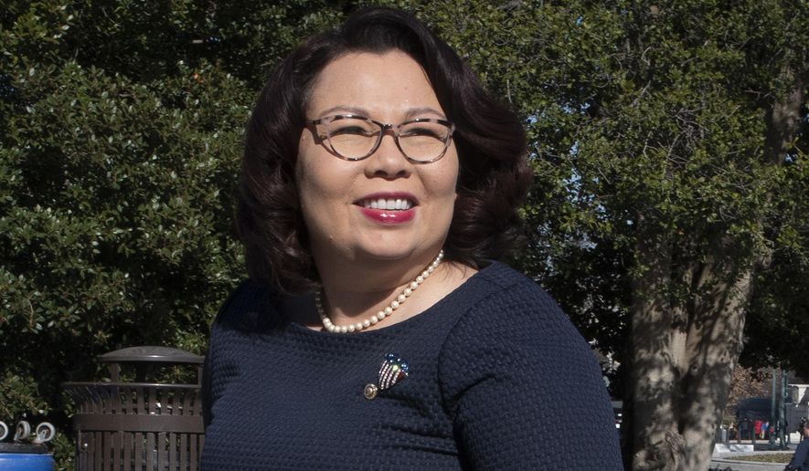 FILE - Sen. Tammy Duckworth, D-Ill., arrives at the Capitol in Washington on Jan. 22, 2020. Duckworth&#39; memoir titled &amp;quot;Every Day Is a Gift&amp;quot; comes out March 30. The Hachette Book Group imprint Twelve announced the deal with Sen. Duckworth on Thursday, Nov. 12, 2020, on the 16th anniversary of when she was shot down while serving in Iraq and lost both of her legs. (AP Photo/Cliff Owen, File)