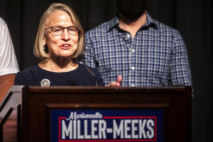 Republican state Sen. Mariannette Miller-Meeks speaks to reporters during an election night watch party, early Wednesday, Nov. 4, 2020, in Riverside, Iowa. Miller-Meeks is running for the seat in the state&#39;s 2nd Congressional District. (Joseph Cress/Iowa City Press-Citizen via AP)