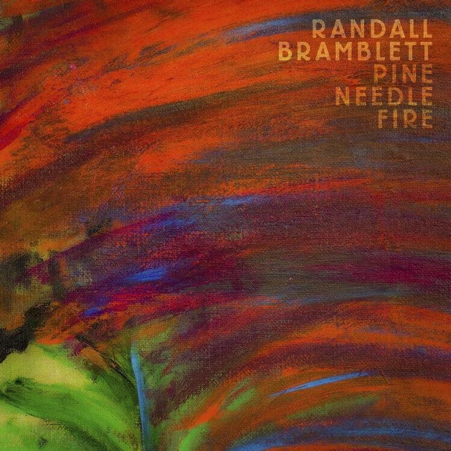 This cover image released by New West Records shows "Pine Needle Fire" by Randall Bramblett. (New West Records via AP)