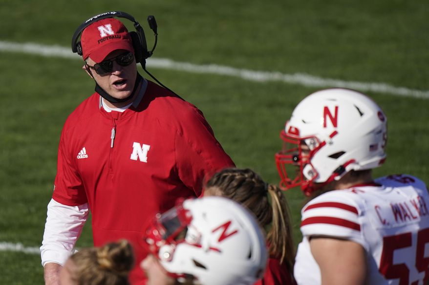 Nebraska head coach Scott Frost talks to his team during the first half of an NCAA college football game against Northwestern in Evanston, Ill., Saturday, Nov. 7, 2020. Northwestern won 21-13. (AP Photo/Nam Y. Huh)