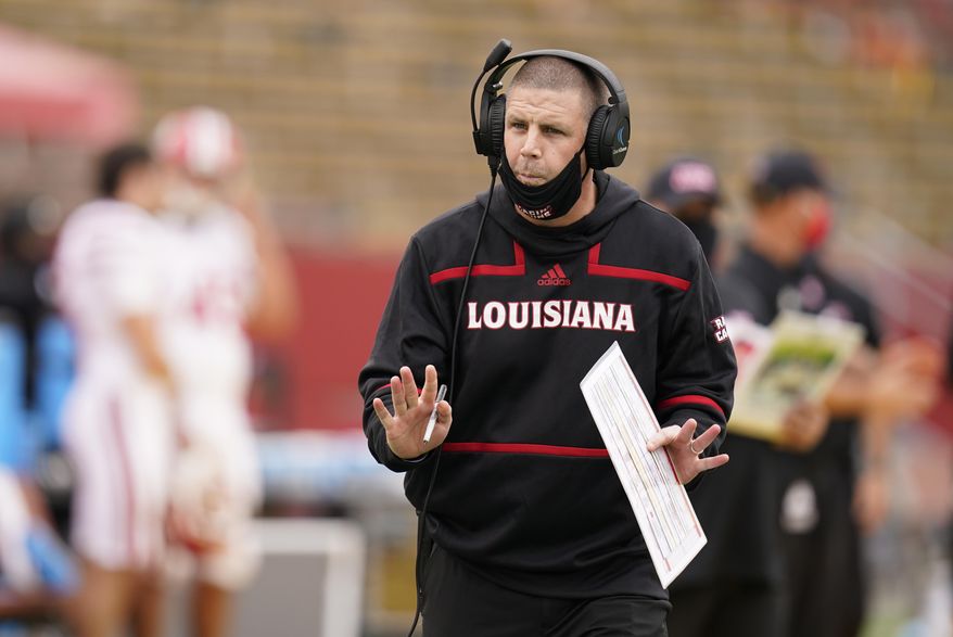 FILE - Louisiana-Lafayette head coach Billy Napier directs his team from the sideline during the second half of an NCAA college football game against Iowa State in Ames, Iowa, in this Saturday, Sept. 12, 2020, file photo. Louisiana-Lafayette won 31-14. No. 25 Louisiana-Lafayette is on track for one of the best seasons in program history under coach Billy Napier. But it could come crashing down this week if the Ragin’ Cajuns stumble against South Alabama. (AP Photo/Charlie Neibergall, FIle)
