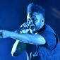 The Weeknd performs on day three at Lollapalooza in Chicago on Aug 4, 2018.  The NFL, Pepsi and Roc Nation announced Thursday, Nov. 12 that the three-time Grammy winner will perform at the 2021 Pepsi Super Bowl Halftime Show on Feb. 7 at Raymond James Stadium in Tampa, Florida. (Photo by Rob Grabowski/Invision/AP, File)