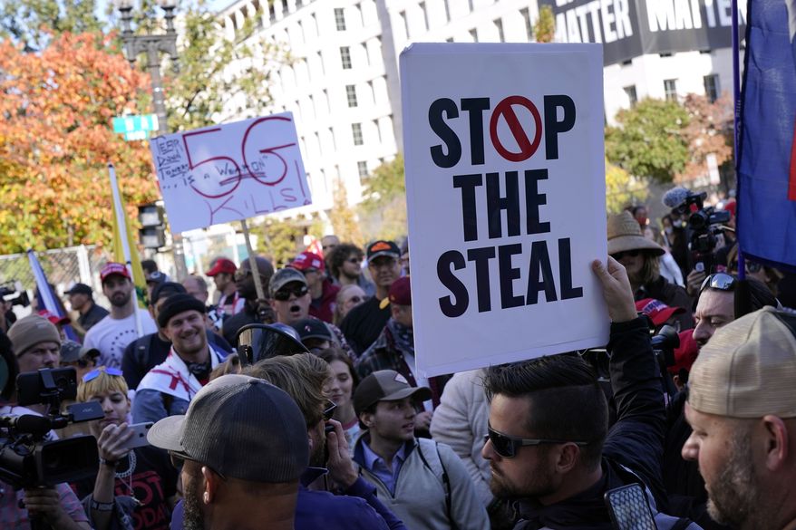 Supporters of President Donald Trump protest Friday Nov. 13, 2020, in Washington. (AP Photo/Jacquelyn Martin)