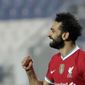 FILE - Liverpool&#39;s Mohamed Salah celebrates his goal against Atalanta during the Champions League, group D soccer match between Atalanta and Liverpool, at the Gewiss Stadium in Bergamo, Italy, Tuesday, Nov. 3, 2020. Salah has tested positive for the coronavirus. The announcement was made by the Egyptian soccer association on Twitter, Friday, Nov. 13,  ahead of Saturday’s game against Togo. (AP Photo/Luca Bruno)