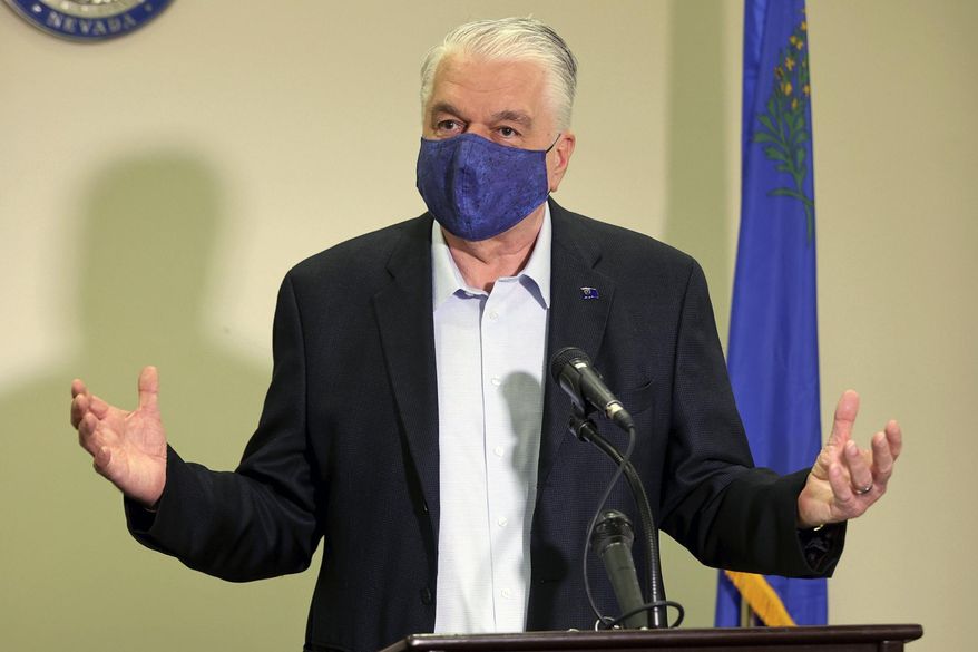 FILE - In this Friday, Oct. 2, 2020 file photo Nevada Gov. Steve Sisolak updates the state&#39;s COVID-19 response during a news conference at the Sawyer Building in Las Vegas. Nevada Gov. Steve Sisolak said that he had tested positive for COVID-19 on Friday, Nov. 13, 2020 as the virus surges to record levels in Nevada and throughout the United States.(K.M. Cannon/Las Vegas Review-Journal via AP, Pool, File)