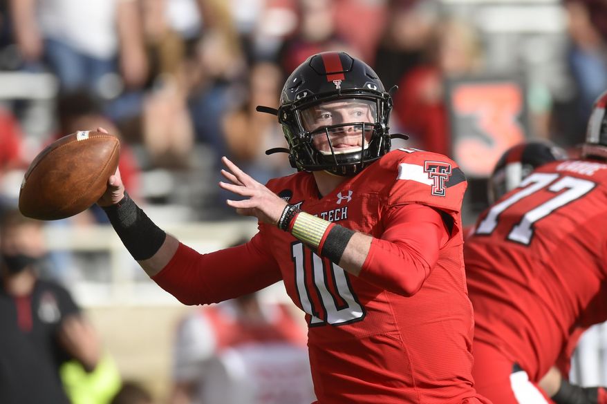 Texas Tech quarterback Alan Bowman (10) looks to throw against Baylor during an NCAA college football game in Lubbock, Texas, Saturday, Nov. 14, 2020. (AP Photo/Justin Rex)