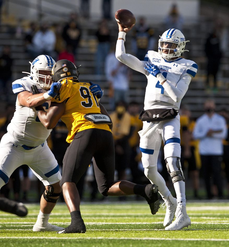 Georgia State quarterback Cornelious Brown IV throws in the first half during an NCAA football game, against Appalachian State Saturday, Nov. 14, 2020, in Boone, N.C. (Walt Unks/Winston-Salem Journal via AP)