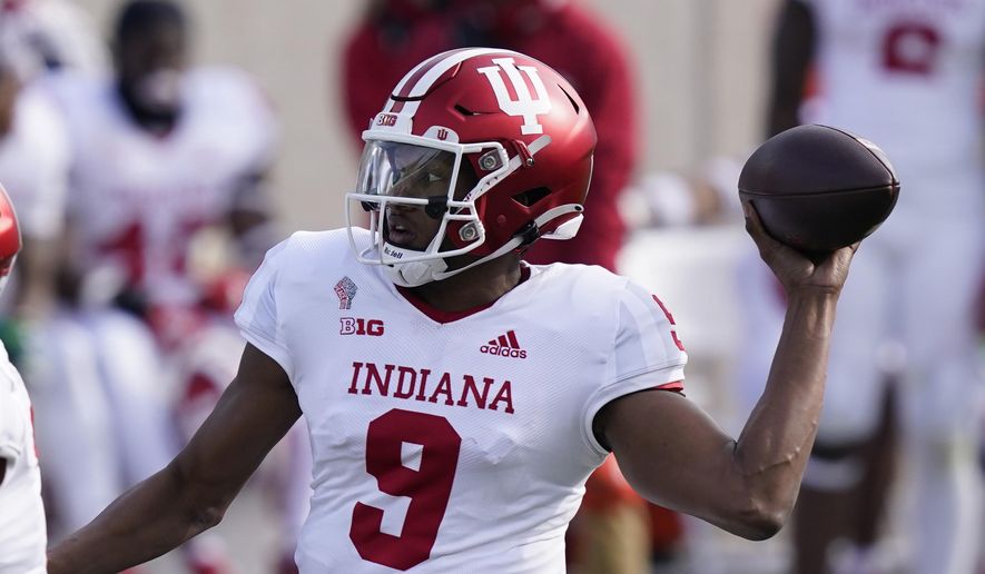 Indiana quarterback Michael Penix Jr. throws during the first half of an NCAA college football game against Michigan State, Saturday, Nov. 14, 2020, in East Lansing, Mich. (AP Photo/Carlos Osorio)