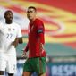 Portugal&#39;s Cristiano Ronaldo gestures during the UEFA Nations League soccer match between Portugal and France at the Luz stadium in Lisbon, Saturday, Nov. 14, 2020. (AP Photo/Armando Franca)