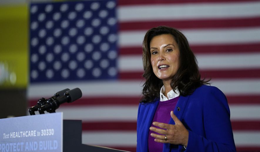 File-This Oct. 16, 2020, file photo shows Michigan Gov. Gretchen Whitmer speaking during an event with Democratic presidential candidate former Vice President Joe Biden at Beech Woods Recreation Center, in Southfield, Mich. Whitmer&#39;s administration on Sunday, Nov. 15, 2020, ordered high schools and colleges to stop in-person classes, closed restaurants to indoor dining and suspended organized sports  including the football playoffs  in a bid to curb the state&#39;s spiking coronavirus cases. The restrictions will begin Wednesday and last three weeks. (AP Photo/Carolyn Kaster, File)