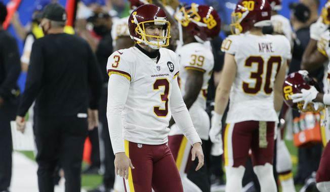 Washington Football Team kicker Dustin Hopkins (3) watches against the Detroit Lions during the first half of an NFL football game, Sunday, Nov. 15, 2020, in Detroit. (AP Photo/Duane Burleson)