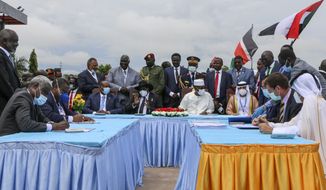 The head of Sudan&#39;s sovereign council, Gen. Abdel-Fattah Burhan, seated center-left, President of South Sudan Salva Kiir, seated center, and President of Chad Idriss Deby, seated center-right, attend a ceremony to sign a peace deal between Sudan&#39;s transitional authorities and a rebel alliance, in Juba, South Sudan, Saturday, Oct. 3, 2020. Sudan&#39;s transitional authorities and a rebel alliance on Saturday signed the peace deal initialed in August that aims to put an end to the country&#39;s decades-long civil wars, in a televised ceremony in Juba, South Sudan marking the agreement. (AP Photo/Maura Ajak)