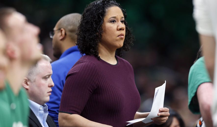 FILE - In this Saturday, Dec. 28, 2019, file photo, then-Boston Celtics assistant coach Kara Lawson watches during the first half of an NBA basketball game against the Toronto Raptors in Boston. Lawson is taking over at Duke after the departure of Joanne P. McCallie. (AP Photo/Michael Dwyer, File)