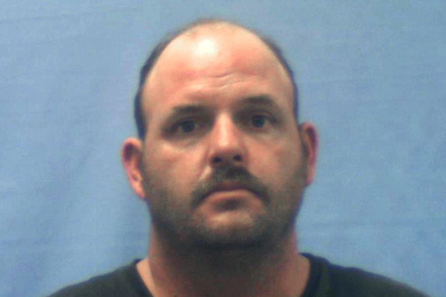 FILE- This undated photo provided by the Crawford County Jail in Van Buren, Ark., shows Rusty Frasier. The Texas man has been sentenced to life in prison for his role in the slayings of a Kansas couple who were killed after a carnival worker ordered their deaths as part of a fictitious carnival mafia. Frasier, of Aransas Pass, Texas, was sentenced Friday, Nov. 13, 2020, to life without parole for 50 years on each of two counts of first-degree murder. (Crawford County Jail via AP)