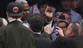 FILE - In this Feb. 8, 2017 file photo, former New York Knicks player Charles Oakley exchanges words with a security guard during the first half of an NBA basketball game between the New York Knicks and the LA Clippers, in New York&#39;s Madison Square Garden. A jury can decide whether former New York Knicks star  Oakley was ejected from Madison Square Garden with excessive force when he was removed as a spectator to a 2017 game, an appeals court ruled Monday. (AP Photo/Frank Franklin II, File)