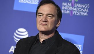 FILE - Quentin Tarantino arrives at the 31st annual Palm Springs International Film Festival Awards Gala on Jan. 2, 2020, in Palm Springs, Calif. The Oscar-winning director has a two-book deal with Harper, beginning with a novelization of &amp;quot;Once Upon a Time ... In Hollywood&amp;quot; that is scheduled for next summer. (Photo by Jordan Strauss/Invision/AP, File)