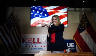 Republican candidate for U.S. Senate Sen. Kelly Loeffler speaks at a campaign rally on Friday, Nov. 13, 2020, in Cumming, Ga. Loeffler and Democratic candidate Raphael Warnock are in a runoff election for the Senate seat in Georgia. (AP Photo/Brynn Anderson)
