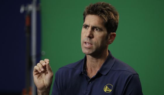 FILE - In this Sept. 30, 2019, file photo, Golden State Warriors general manager Bob Myers gestures during the NBA basketball team&#x27;s media day in San Francisco. Myers hears the chatter about everything riding on Golden State&#x27;s draft pick at second overall. About all the pressure on his shoulders to find just the right player to join Stephen Curry and Klay Thompson, regular All-Stars Draymond Green and Andrew Wiggins. Someone who will make an instant impact and immediately help the Warriors return to contention and respectability following a last-place finish. (AP Photo/Ben Margot, File)