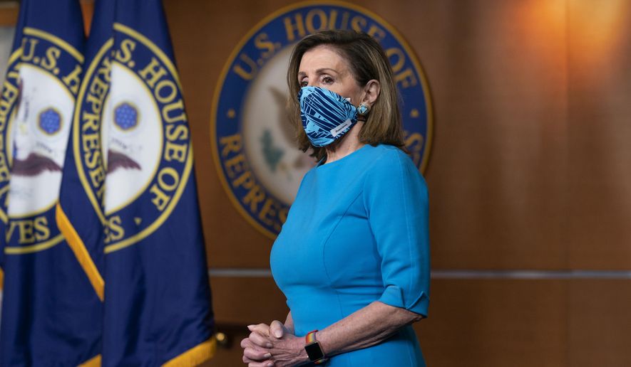 In this Nov. 12, 2020, file photo speaker of the House Nancy Pelosi, D-Calif., pauses as she meets with reporters on Capitol Hill in Washington.  (AP Photo/J. Scott Applewhite, File)  **FILE**