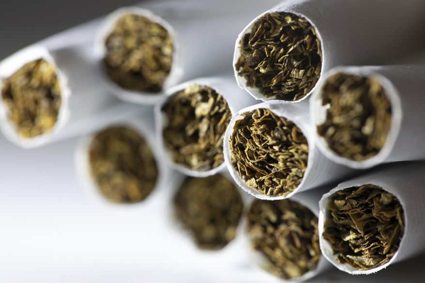 This Dec. 17, 2019, file photo shows a group of cigarettes in New York. (AP Photo/Patrick Sison) ** FILE **